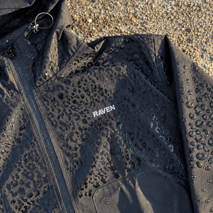 Water Reactive Cheetah Rain Jacket - Black